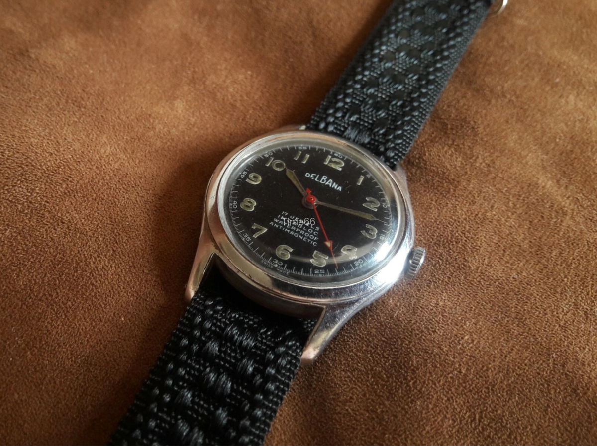 DELBANA MILITARY BLACK DIAL — RELÓGIO DE SERVIÇO DA SEGUNDA GUERRA MUNDIAL (DÉCADA DE 1940)